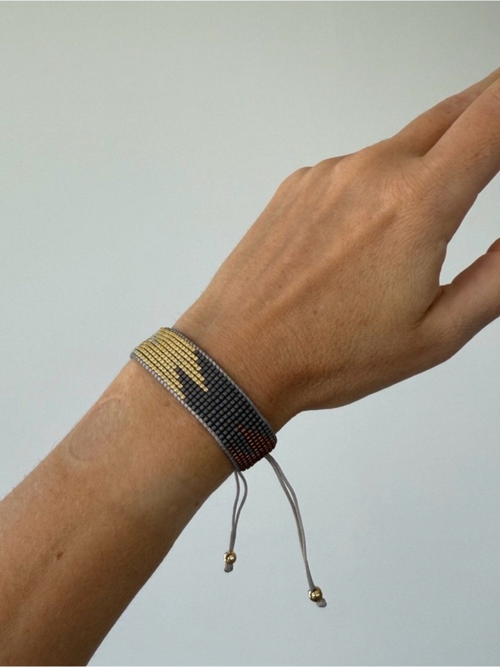 Handmade Beaded Bracelet in Gold and Gunmetal